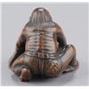 Image 7 : A wood netsuke of Oni.