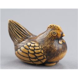 An ivory netsuke of chicken.