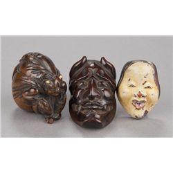 Group of three wood netsuke.