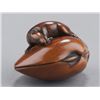 Image 1 : A wood netsuke of rat on a Hamaguri.