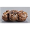 Image 5 : A group of three netsuke of tigers.