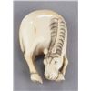 Image 1 : An ivory netsuke of a horse.