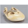 Image 5 : An ivory netsuke of a horse.