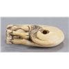 Image 6 : An ivory netsuke of a horse.