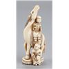 Image 1 : An ivory netsuke of a horse and two karako.