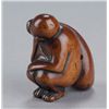 Image 4 : Group of two wood netsuke of monkeys.