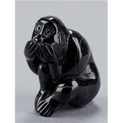An Umimatsu netuske of a seated monkey.