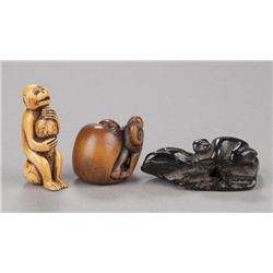 A group of three netsuke of monkeys, various mater