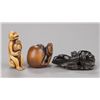 Image 1 : A group of three netsuke of monkeys, various mater