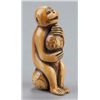 Image 2 : A group of three netsuke of monkeys, various mater