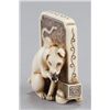 Image 2 : An ivory netsuke of dog seated in front of tsuitat