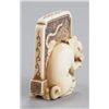 Image 4 : An ivory netsuke of dog seated in front of tsuitat