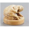 Image 5 : A group of three netsuke of dogs, various material