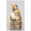Image 10 : A group of three ivory netsuke of dogs.
