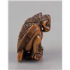 Image 4 : A wood netsuke of an eagle.