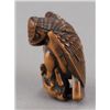 Image 5 : A wood netsuke of an eagle.