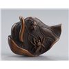 Image 1 : A wood netsuke of a lotus leaf.