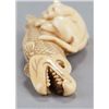 Image 4 : An ivory netsuke of a cat.