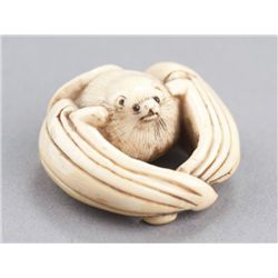 An ivory netsuke of a bat.