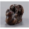 Image 4 : A wood netsuke of an octopus and monkey.