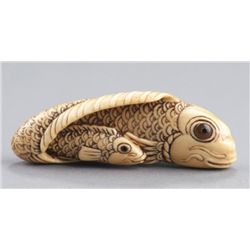 An ivory netsuke of a Carp and young.
