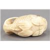 Image 4 : An ivory netsuke of a sea bream.