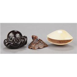 A group of three netsuke.
