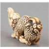 Image 4 : An Ivory netsuke of a baku.