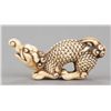 Image 7 : An Ivory netsuke of a baku.
