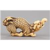 Image 8 : An Ivory netsuke of a baku.