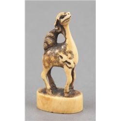 An ivory netsuke of a kirin.