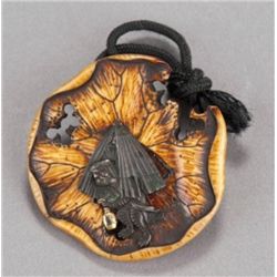 A ivory manju of a kappa.