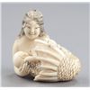 Image 1 : An ivory netsuke of a mermaid.