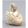 Image 2 : An ivory netsuke of a mermaid.