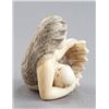 Image 5 : An ivory netsuke of a mermaid.