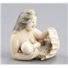 Image 6 : An ivory netsuke of a mermaid.