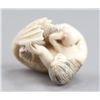 Image 8 : An ivory netsuke of a mermaid.
