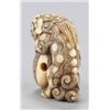 Image 3 : An ivory netsuke of a Shishi.
