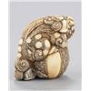 Image 4 : An ivory netsuke of a Shishi.