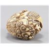 Image 7 : An ivory netsuke of a Shishi.