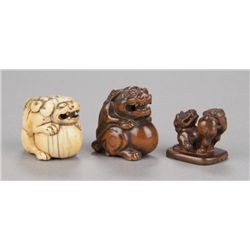 A group of three Shishi netsuke.