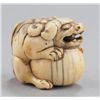 Image 5 : A group of three Shishi netsuke.