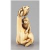 Image 1 : An ivory netsuke of a siniu and monkey.