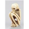 Image 2 : An ivory netsuke of a skeleton.