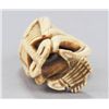 Image 5 : An ivory netsuke of a skeleton.