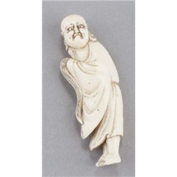 An ivory netsuke of Daruma.