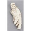 Image 1 : An ivory netsuke of Daruma.