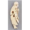 Image 2 : An ivory netsuke of Daruma.