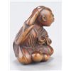 Image 4 : A wood netsuke of a mendicant.