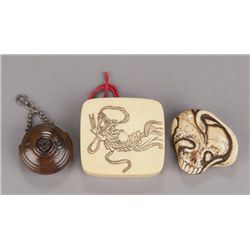A group of three netsuke.